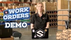 Women in warehouse with Work Orders Demo text